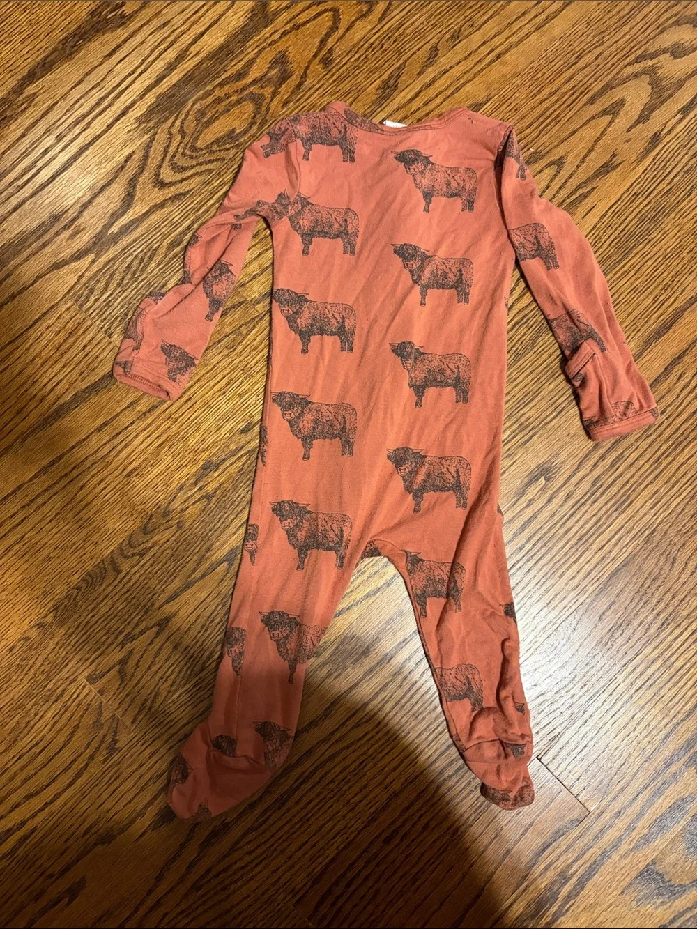 kate quinn Rust Orange Footed One-Piece with Black Highland Cow Print